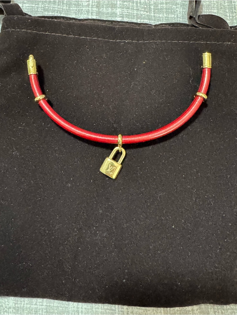 Louis Vuitton Red Leather Bracelet with Gold Padlock Charm
